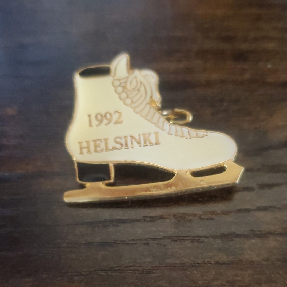 Helsinki 1992 Ice Skate Pin - Gold Tone and Cream.  Location: Helsinki